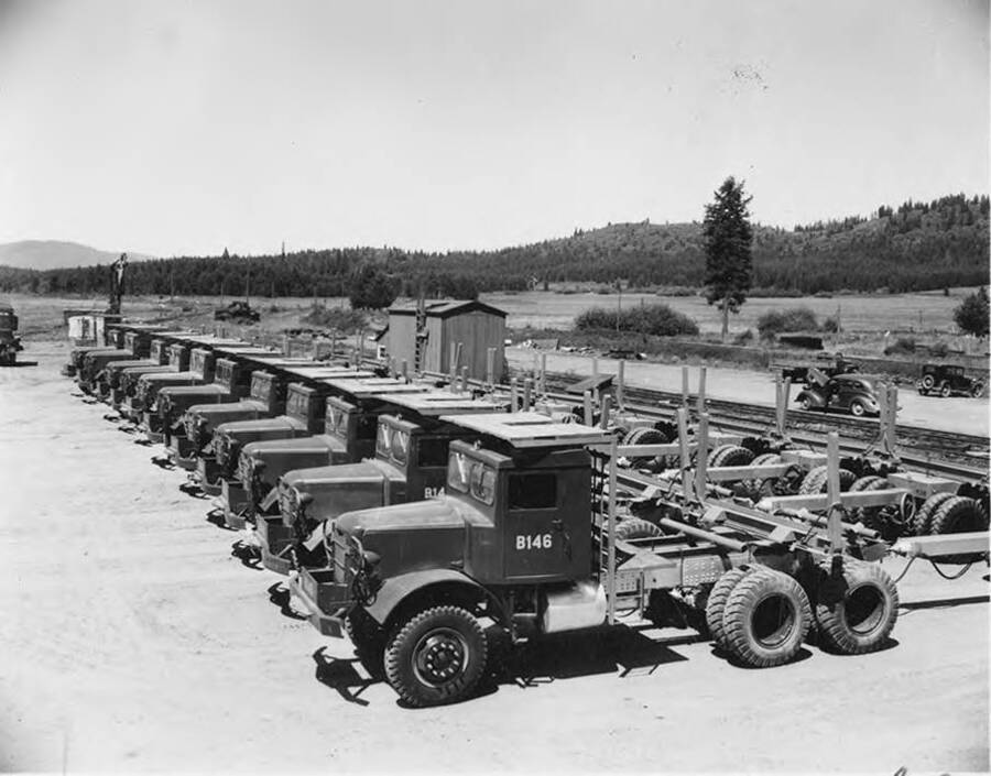 Trucks used to carry lumber are lined up reading to leave the Bovill, Idaho yard.