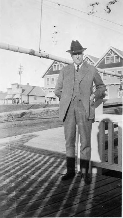 A. W. Laird stands in front of the Potlatch mill office in Potlatch, Idaho.