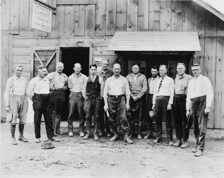 These men are that which helped built the first mill at Lewiston. Written on the photograph is 'Teo Matkes and his able assistants, who built the Clearwater timber co plant at Lewiston, IDA in 1926-27.'