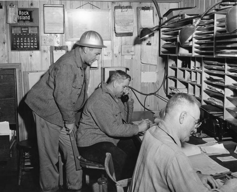 Gio Rauch, Earl Ritzheimer (on the telephone) and Lye Lyle Taylor (the clerk) work in the Camp 44 office.