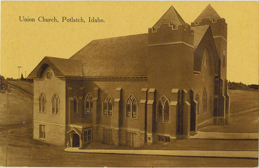 A postcard showing the exterior of the Union Church in Potlatch Idaho. The building was constructed in 1912 by the Potlatch company and was used as both a church (representing as many as 22 different Protestant denominations) and community center. The auditorium seated 700. The average Sunday school attendance was 225. The structure burned down in 1951.