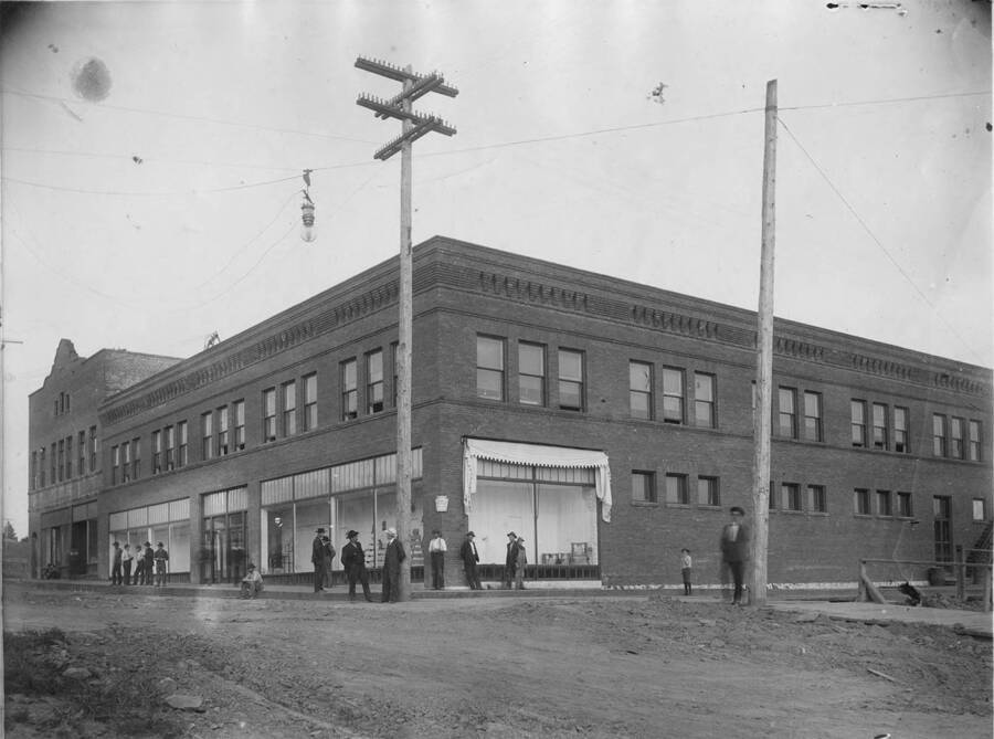 The exterior of the Potlatch General store. Note the electrical poles and lights on both corners.