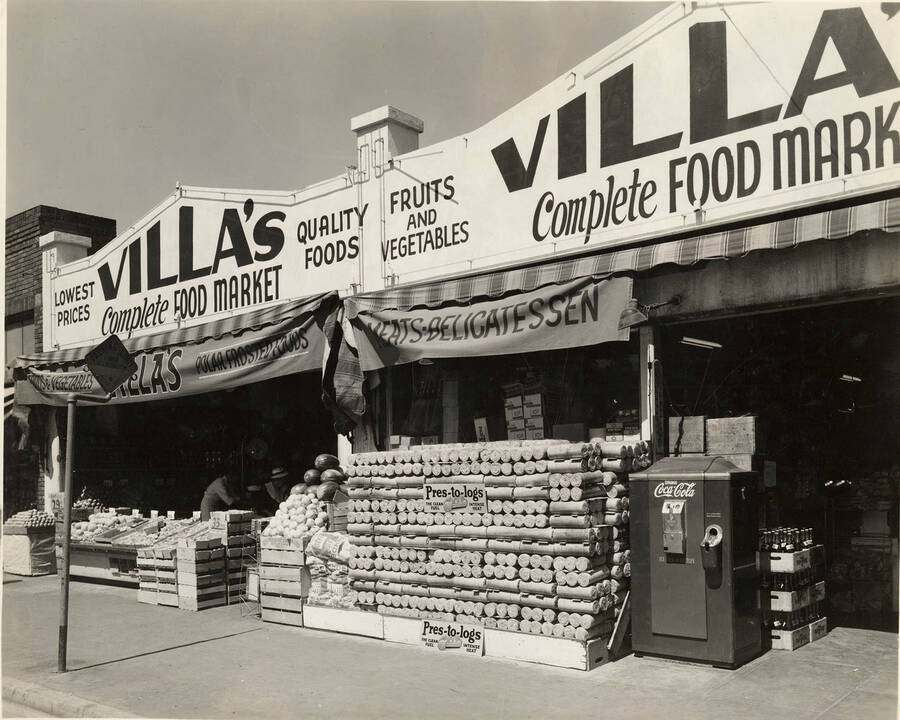 A stack of Pres-to-logs stand outside Villa's complete food market.