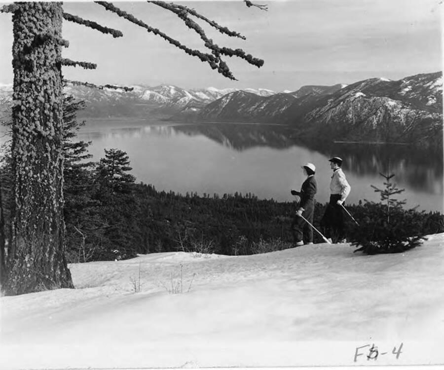 A couple overlooks lake Pend Oreille on Blacktail in Northern Idaho.