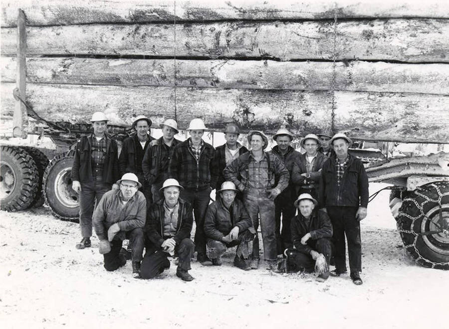 The crew of Camp 57 taken in the 1950s. Back row from left to right is John Schenhost, unknown, Ed Swanson, three unknowns, Don Profit, Carl Bean, Frosty Deforrest, Ken Humiston. Front row from left to right is Cecil Robertson, Ed ? Ray McKenning(?), and Harvey Spears.