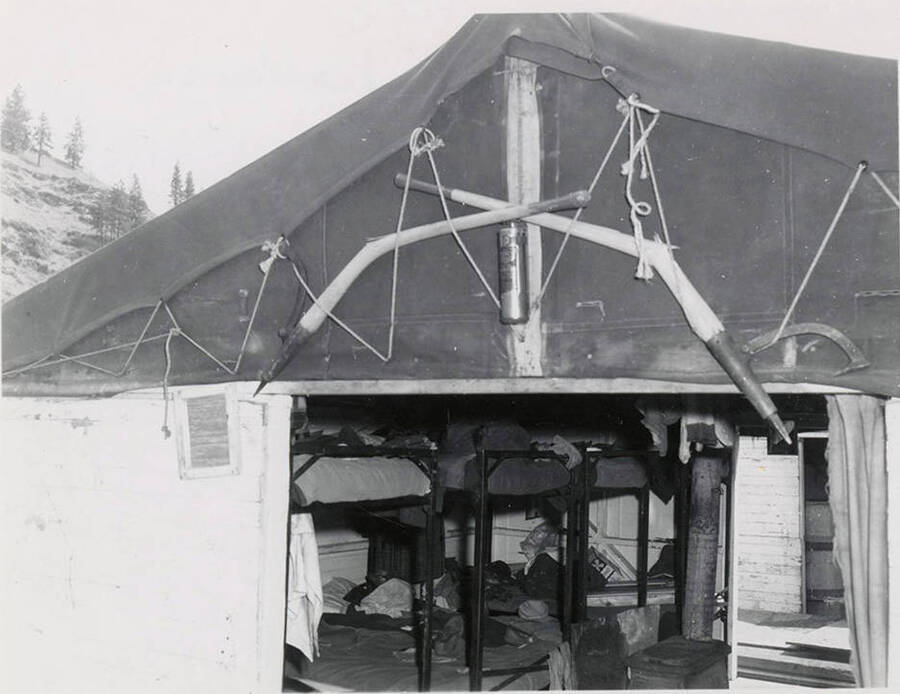 A look of the one of the bunkhouses at camp 62. The description on the back says 'Wannigam - mid 1950s "Coat of arms"' bunkhouse.