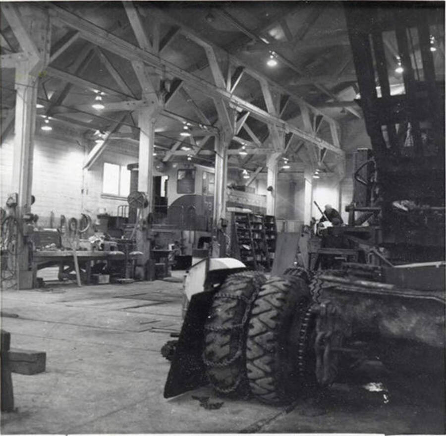 Looking at the repair shop in Lewiston. A large tractor can be seen to the right of the photograph.