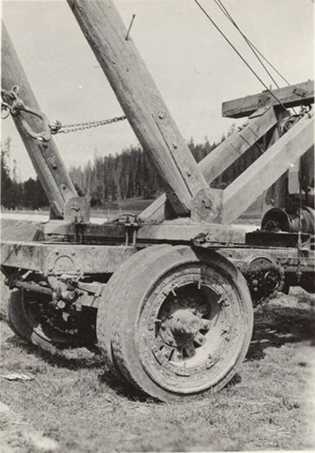 A solid rubber tire on a wooden wheel for a A-frame Loader.