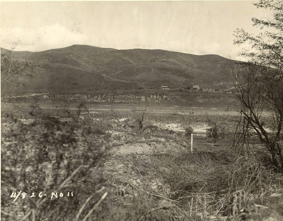 Site of the Lewiston Paper mill. Written on the photograph it says the photo is taken from the south bank, so it is looking north across the Clearwater river. Stamped on the back of the photograph is J.F. Anderson, Photo. Phone 1445-J.