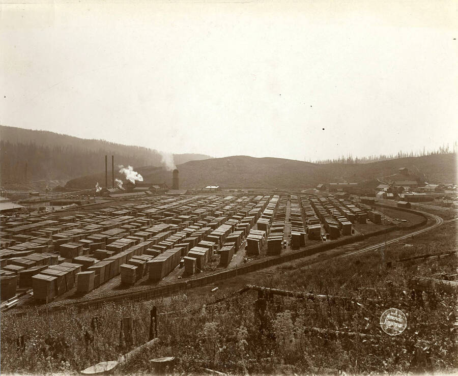 Part of a "three plate panoramic view of the plant at Elk River from hill. [This plate shows] railroad station, office, hotel, and hospital." Description taken from American Lumberman papers found within the folder. Photograph taken between September 28 and October 4.