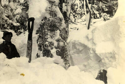 Sawyer Lee Lang pauses a moment before resuming work with this snow shovel.