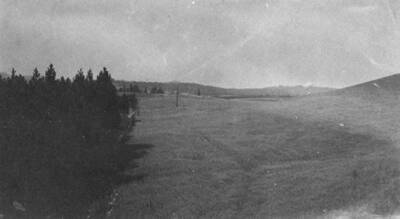 Hearing before the Board of Equalization, Moscow, July 28, 1913. 24 views of land with legal description and assessment of each parcel. Lot 3 or NW1/4SW1/4 31-42-4W; at right of picture D.D. Harroun land addressed at $40.00 per acre. NE1/4SE1/4 36-42-5W; at left of picture Potlatch Lumber Co. land assessed at $20.00 per acre.