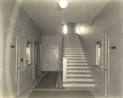 Interior stairway. Land Department door at rear, Auditing Department at right of photo.
