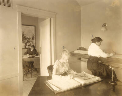 Employees busy in Land Dept. Office