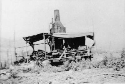 A steam donkey works on Frei Ridge, North Northeast of Bovill, Idaho.
