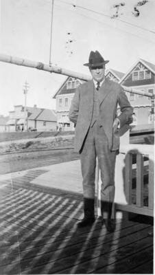 A. W. Laird stands in front of the Potlatch mill office in Potlatch, Idaho.