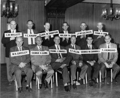 Men pose for a re-enactment of Organization meeting of January 1909. This is the 50th anniversary of the Western Forestry and Cons. Association. They met in Spokane, Washington December 9-11, 1959. Standing left to right: George Neff, Lee White, Geo Beandmore, Max Tripp, Bill Cochoran, Al Hansen. Seated Left to right: Car Klehm, Bud Davis, Earl Rettig, H? Gloscack, Jr. (?), George Cox, Bert Curtis.