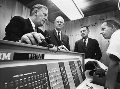 Management of Potlatch Forests, INC. first examined the newly-installed IBM 1710 process control unit at its Lewiston, Idaho paper mill in early September. Show here from left V. V. Vallandigham, vice president for pulp, paper, and converting; Edwin C. Rettig, executive vice president and general manager; Donald Keller, production manager, and Dwain M. Bates, instrumentation engineer.