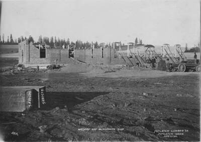 Construction underway for the machine and blacksmith shop.