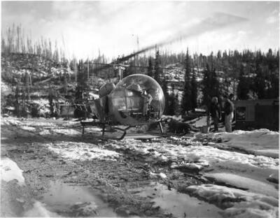 Using a helicopter to do aerial seeding. Pictured here on Washington Creek, Idaho.