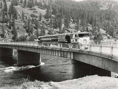 A truck transports logs destined for the Iowa State Fair.