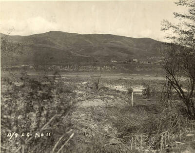 Site of the Lewiston Paper mill. Written on the photograph it says the photo is taken from the south bank, so it is looking north across the Clearwater river. Stamped on the back of the photograph is J.F. Anderson, Photo. Phone 1445-J.