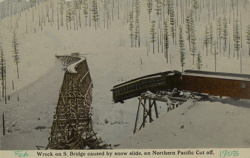 Wreck on S bridge caused by snow slide on Northern Pacific cut off.