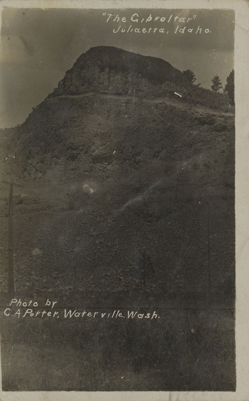 Postcard is a photograph of a large hill near Juliaetta, Idaho.