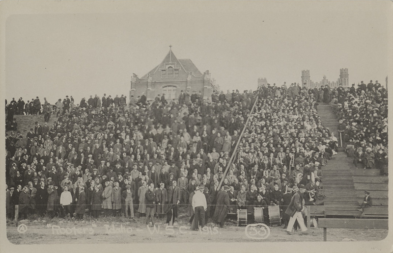 Postcard of the spectators at a football game between the University of Idaho and Washington State College.