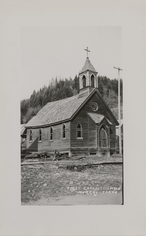 Postcard of the First Catholic Church in Murray, Idaho.