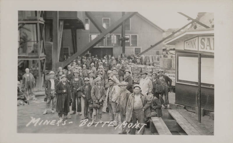 Postcard of miners outside of a mine in Butte, Montana