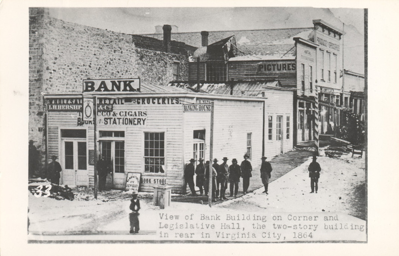 Postcard of men standing near a bank in Virginia City, Montana.