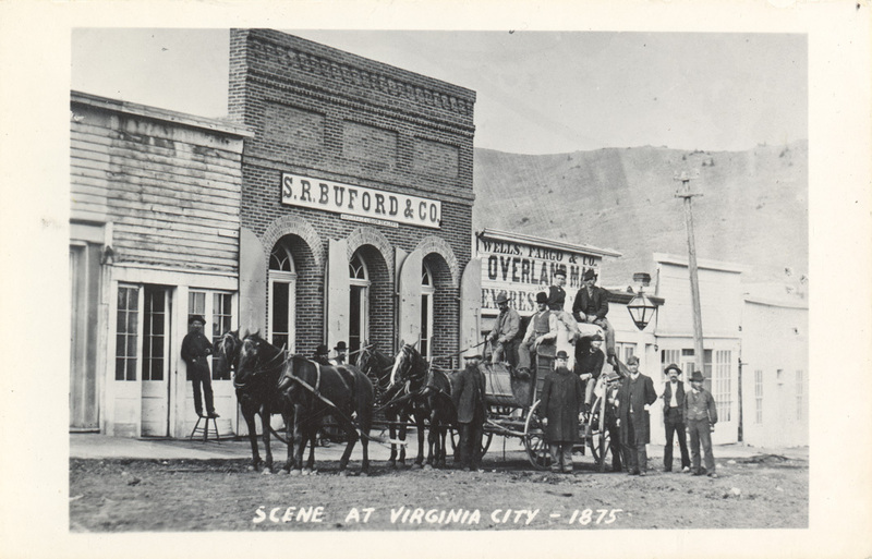 Postcard of men on and near a horse-drawn wagon in Virginia City, Montana.