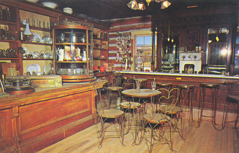 Postcard of the interior of a drug store in Nevada City, Montana.