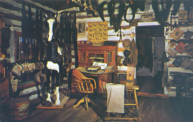 Postcard of the interior of a harness shop in Nevada City, Montana.