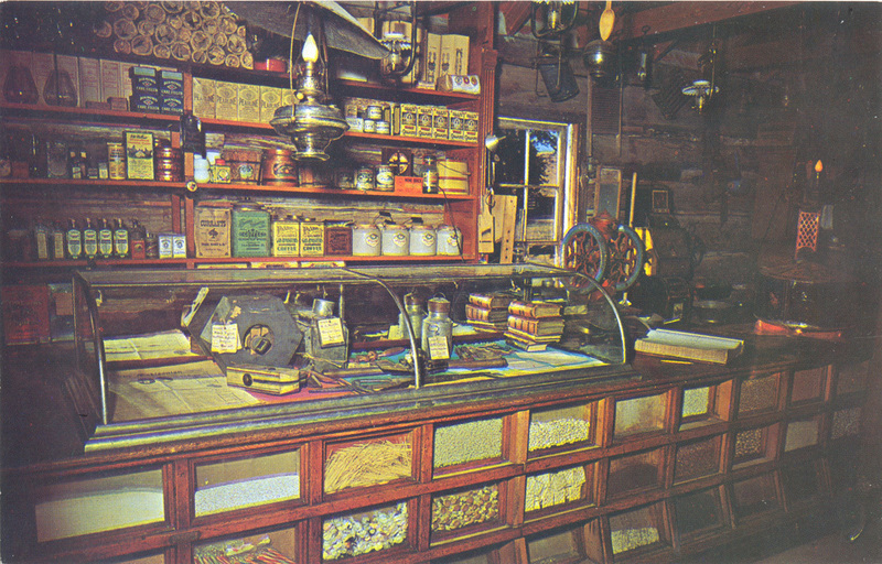 Postcard of the interior of a shop in Nevada City, Montana.