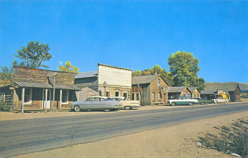 Postcard of historic buildings and cars in Nevada City, Montana.