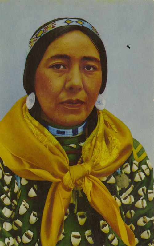 Postcard of a Native American woman.|  A crow Indian of the Yellowtail family.