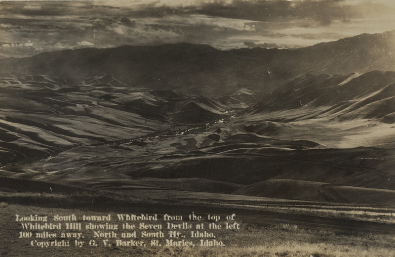 Postcard of a canyon and mountains near White bird, Idaho. | Looking south toward White bird from the top of White bird Hill showing the Seven Devils at the left 100 miles away. North and South Hy. Idaho.