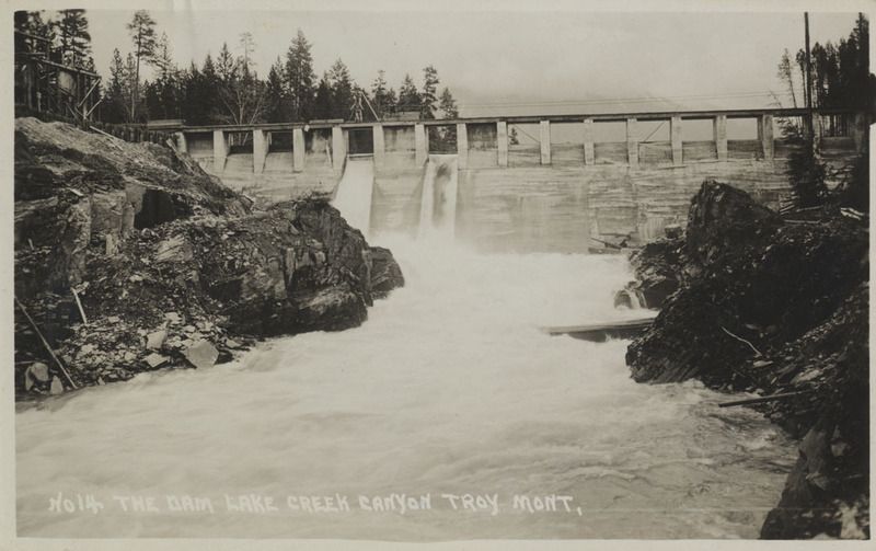 Postcard of a dam in Lake Creek Canyon near Troy, Montana.