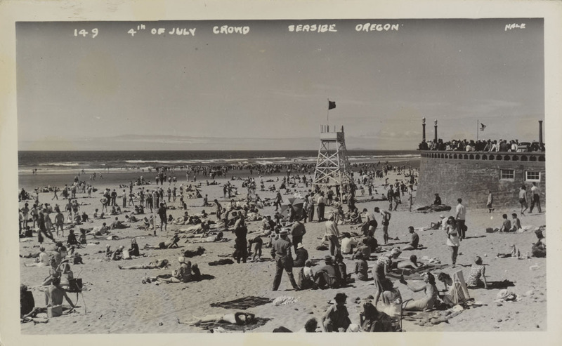 Postcard of people on a beach at Seaside, Oregon.