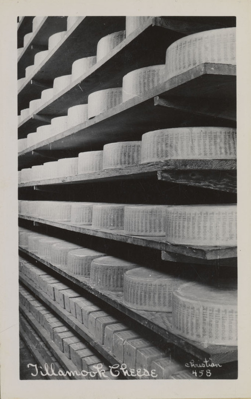 Postcard of wheels of cheese aging in the Tillamook Cheese Factory in Tillamook, Oregon.