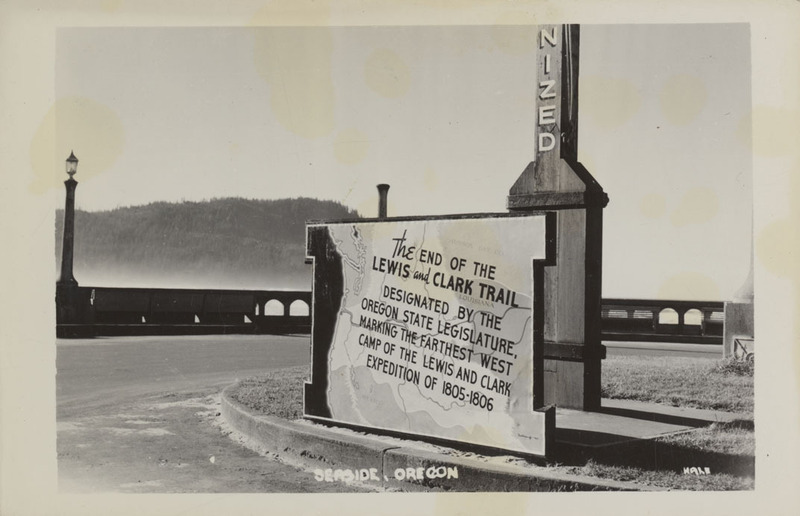 Postcard of a sign marking the end of the Lewis & Clark Trail in Seaside, Oregon.