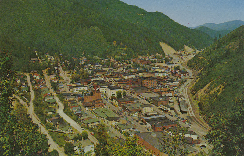 Postcard of Wallace, Idaho. | Wallace, Idaho, population 3200 nestles in the heart of the famous Coeur d'Alene mining district. In winter, elk may be seen from these hill sides and beyond them lies fine trout streams.