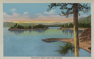Postcard is part of a postcard packet. Image is of Memaloose Island in Lake Pend Oreille.