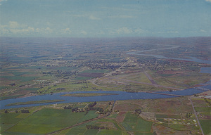 Postcard is an aerial photograph of Burley, Idaho.