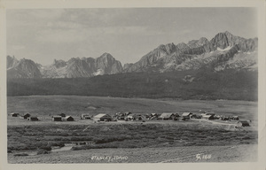 Postcard of Stanley, Idaho with the Sawtooth mountains in the background.