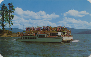 Postcard of boats on Lake Coeur d'Alene, Idaho. | Seeweewana and Dancewana cruising on Beautiful Lake Coeur d'Alene. Lake Coeur d'Alene and shadowy St. Joe River. Regular passenger and charter cruises. Finney Transportation Co. Capt. John F. Finney, Coeur d'Alene, Idaho.
