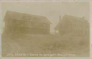 Postcard of the Sigma Nu and Gamma Phi-Beta on the University of Idaho campus in Moscow, Idaho.