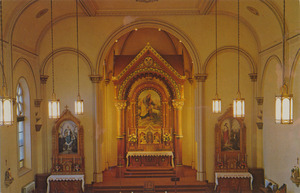 Postcard of the interior of the chapel at St. Gertrude's Convent in Cottonwood, Idaho. | The main altar was constructed of rich oak wood at Sigmaringen, Germany, and reached Cottonwood on March 12, 1928. Roman in style, it was planned by Englebert Gier, architect for the blue porphyry section of the Convent. All parts were mortised and glued so that not a single nail was used.